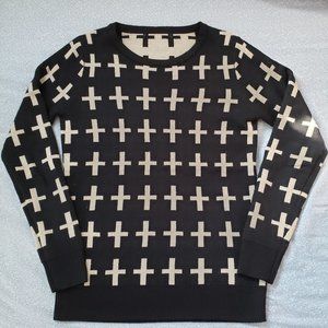 + Cross sweater